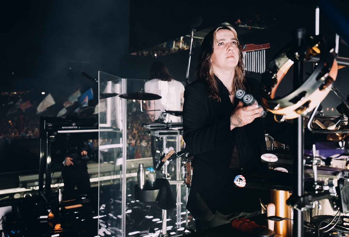 Gabi King Playing LP percussion on stage at Glastonbury with The 1975